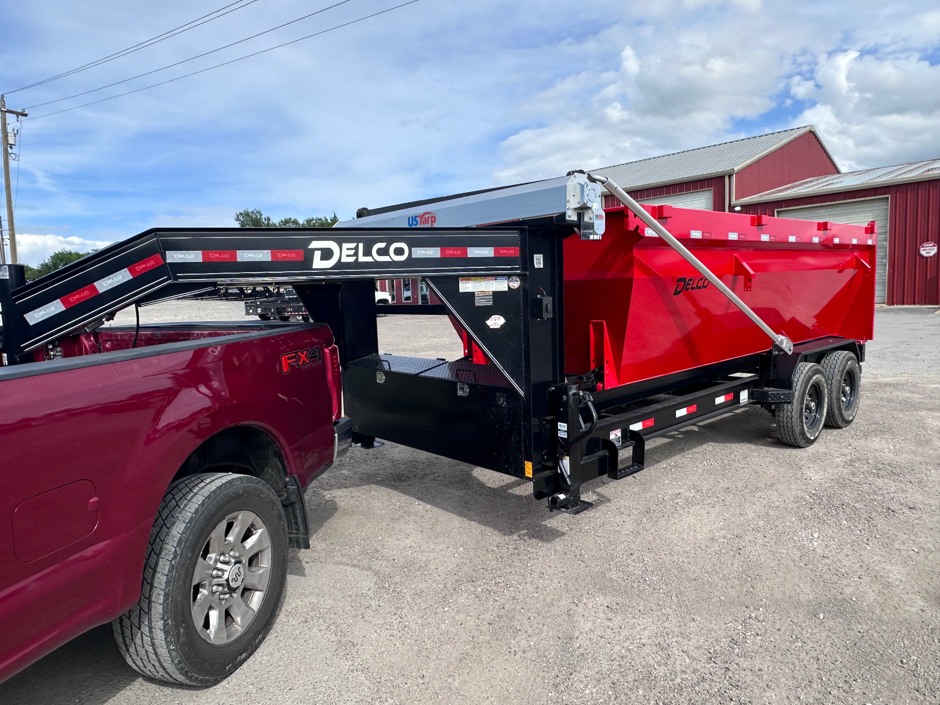 HomeHaven Dumpsters 16-yard DELCO roll-off trailer and tow vehicle